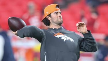 Denver Broncos quarterback Jarrett Stidham (8) throws a pass before a Christmas Day NFL