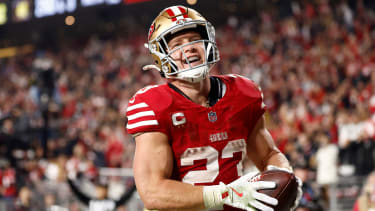 Nov 24, 2025; Santa Clara, California, USA; San Francisco 49ers running back Christian McCaffrey (23) reacts after scoring a touchdown against the Carolina Panthers during the second half at Levi's Stadium. Mandatory Credit: Kelley L Cox-Imagn Images