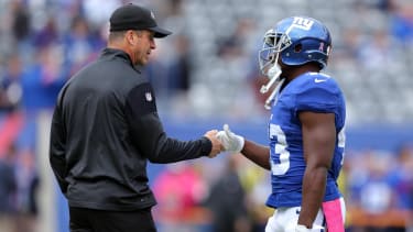 New York Giants running back Shane Vereen (34) with Baltimore Ravens head coach John Harbaugh before a game