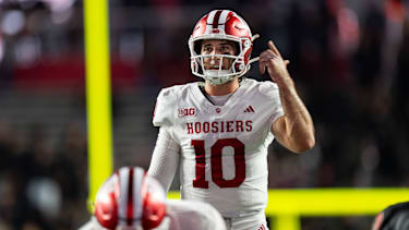 Indiana Hoosiers v Rutgers Scarlet Knights - NCAA, College League, USA FBS Football Josh Hoover of the Indiana Hoosiers lines up prior to the snap during an NCAA FBS football game at SHI Stadium in Piscataway, United States, on October 3, 2026. Piscataway United States PUBLICATIONxNOTxINxFRA Copyright: xDanxSquicciarinix originalFilename:squicciarini-indianah261003_nppnK.jpg