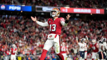 San Francisco 49ers quarterback Brock Purdy (13) celebrates after scoring a touchdown