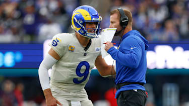 Los Angeles Rams quarterback Matthew Stafford (9) speaks with head coach Sean McVay