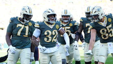 Green Bay Packers Running Back Marshawn Lloyd (32) feiert einen Touchdown gegen die Chicago Bears.
