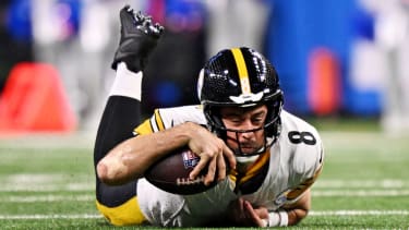 Pittsburgh Steelers quarterback Aaron Rodgers (8) catches a pass during the fourth quarter against the Detroit Lions at Ford Field. Mandatory Credit: Lon Horwedel-Imagn Images
