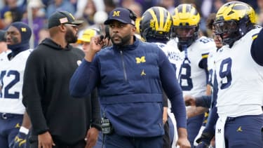 Nov 15, 2025; Chicago, Illinois, USA; Michigan Wolverines head coach Sherrone Moore on the sidelines against the Northwestern Wildcats during the first half at Wrigley Field. Mandatory Credit: David Banks-Imagn Images