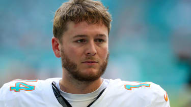Sep 14, 2025; Miami Gardens, Florida, USA; Miami Dolphins quarterback Quinn Ewers (14) looks on before a game against the New England Patriots at Hard Rock Stadium. Mandatory Credit: Nathan Ray Seebeck-Imagn Images