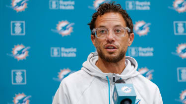 Aug 8, 2025; Lake Forest, IL, USA; Miami Dolphins head coach Mike McDaniel speaks before joint training camp practice with the Chicago Bears ahead of Sunday's preseason opener. Mandatory Credit: Kamil Krzaczynski-Imagn Images
