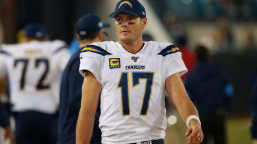 Dec 8, 2019; Jacksonville, FL, USA; Los Angeles Chargers quarterback Philip Rivers (17) walks on the bench during the second half against the Jacksonville Jaguars at TIAA Bank Field. Mandatory Credit: Reinhold Matay-Imagn Images