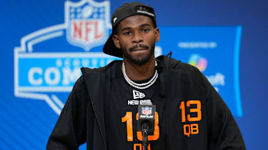 Colorado quarterback Shedeur Sanders speaks during a press conference at the NFL football scouting combine Friday, Feb. 28, 2025, in Indianapolis. (AP Photo/George Walker IV)