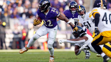 Dec 7, 2025; Baltimore, Maryland, USA; Baltimore Ravens running back Derrick Henry (22) runs with the ball against the Pittsburgh Steelers during the first half at M&amp;T Bank Stadium. Mandatory Credit: Peter Casey-Imagn Images