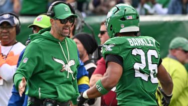 Oct 26, 2025; Philadelphia, Pennsylvania, USA; Philadelphia Eagles offensive coordinator Kevin Patullo and running back Saquon Barkley (26) against the New York Giants at Lincoln Financial Field. Mandatory Credit: Eric Hartline-Imagn Images