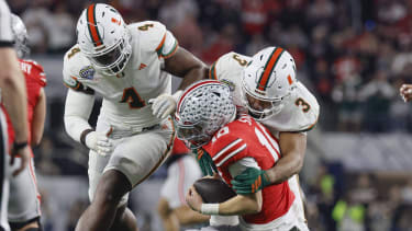 December 31, 2025: Miami defensive linemen Rueben Bain Jr. (4) and Akheem Mesidor (3) sack Ohio State quarterback Julian Sayin (10) during the first half of a College Football Playoff quarterfinal in the Cotton Bowl on Wednesday, Dec. 31, 2025, at AT&T Stadium in Arlington, Texas. - ZUMAm67_ 20251231_zaf_m67_016 Copyright: xAlxDiazx