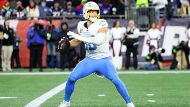 FOXBOROUGH, MA - JANUARY 11: Justin Herbert 10 of the Los Angeles Chargers rears back to throw during an AFC Wildcard game between the New England Patriots and the Los Angeles Chargers on January 11, 2026, at Gillette Stadium in Foxborough, Massachusetts. (Photo by Fred Kfoury III Icon Sportswire) NFL, American Football Herren, USA JAN 11 AFC Wildcard Chargers at Patriots EDITORIAL USE ONLY Icon482260111165