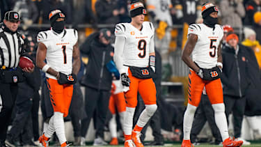 Cincinnati Bengals wide receiver Ja Marr Chase (1), quarterback Joe Burrow (9) and wide receiver Tee Higgins