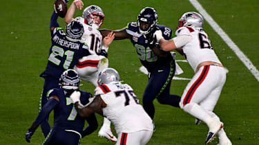 NFL, American Football Herren, USA 2026: Super Bowl LX Seahawks Vs Patriots Feb 08 February 08, 2026 Seattle Seahawks cornerback Devon Witherspoon (21) forces a fumble against New England Patriots quarterback Drake Maye (10) during Super Bowl LX between the Seattle Seahawks and the New England Patriots at Levi s Stadium in Santa Clara, California. Mandatory Photo Credit : Charles Baus CSM (Credit Image: Â Charles Baus Cal Media) Santa Clara Ca United States of America EDITORIAL USE ONLY Copyright: xx ZUMA-20260208_faf_c04_199.jpg CharlesxBausx csmphotothree472787