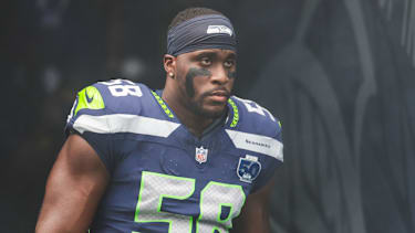 Sep 7, 2025; Seattle, Washington, USA; Seattle Seahawks linebacker Derick Hall (58) stands outside the tunnel during player introductions against the San Francisco 49ers at Lumen Field. Mandatory Credit: Joe Nicholson-Imagn Images