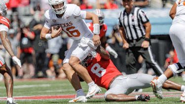 August 30, 2025, Columbus, Ohio, U.S: Texas Longhorns quarterback Arch Manning (16) is tackled by Ohio State Buckeyes linebacker Arvell Reese (8) during the game between the Texas Longhorns and the Ohio State Buckeyes at Ohio Stadium, Columbus, Ohio. Columbus U.S - ZUMAs304 20250830_zaf_s304_033 Copyright: xScottxStuartx
