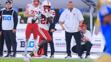 November 8, 2025, Pasadena, California, USA: 21 Emmett Johnson, RB of the Nebraska Cornhuskers makes a catch and runs for a touchdown during a regular season NCAA, College League, USA football game against the UCLA Bruins on Saturday November 8, 2025 at the Rose Bowl Stadium in Pasadena, California. Bruins lose to Cornhuskers, 21-28. JAVIER ROJAS PI Pasadena USA - ZUMAp124 20251108_zaa_p124_023 Copyright: xJavierxRojasx