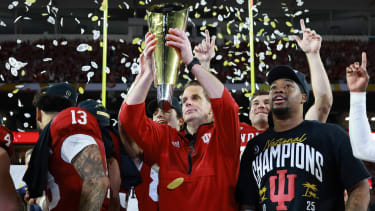 NCAA, College League, USA Football: CFP National Championship-Miami vs Indiana Jan 19, 2026; Miami Gardens, FL, USA; Indiana Hoosiers head coach Curt Cignetti hoists the National Championship trophy in the air after the College Football Playoff National Championship game at Hard Rock Stadium. Miami Gardens Hard Rock Stadium FL USA, EDITORIAL USE ONLY PUBLICATIONxINxGERxSUIxAUTxONLY Copyright: xMarkxJ.xRebilasx 20260119_mcd_su5_226