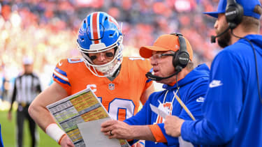 Denver Head Coach, Sean Payton and Bo Nix 10 of the Denver Broncos, discuss a play during a game between the Los Angeles Chargers and the Denver Broncos at Empower Field at Mile High in Denver, CO on January 04, 2026.