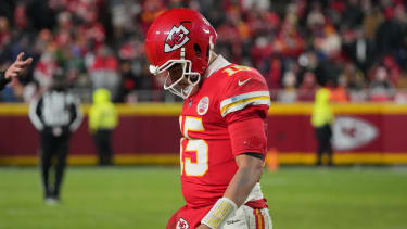Dec 7, 2025; Kansas City, Missouri, USA; Kansas City Chiefs quarterback Patrick Mahomes (15) lowers his head during the fourth quarter against the Houston Texans at GEHA Field at Arrowhead Stadium. Mandatory Credit: Denny Medley-Imagn Images