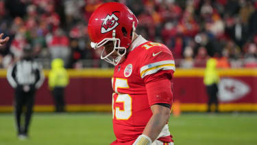 Dec 7, 2025; Kansas City, Missouri, USA; Kansas City Chiefs quarterback Patrick Mahomes (15) lowers his head during the fourth quarter against the Houston Texans at GEHA Field at Arrowhead Stadium. Mandatory Credit: Denny Medley-Imagn Images