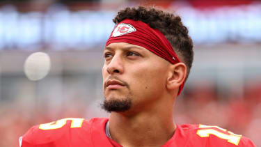 KANSAS CITY, MISSOURI - SEPTEMBER 14: Patrick Mahomes #15 of the Kansas City Chiefs stands on the sideline during the national anthem prior to an NFL football game against the Philadelphia Eagles at GEHA Field at Arrowhead Stadium on September 14, 2025 in Kansas City, Missouri. (Photo by Kevin Sabitus/Getty Images)