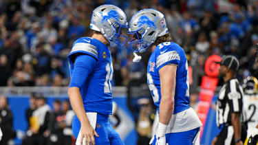 Dec 21, 2025; Detroit, Michigan, USA; Detroit Lions wide receiver Isaac Teslaa (18) scores a touchdown during the third quarter against the Pittsburgh Steelers at Ford Field. Mandatory Credit: Lon Horwedel-Imagn Images