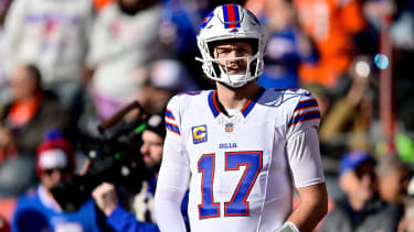 DENVER, CO - JANUARY 17: Buffalo Bills quarterback Josh Allen (17) looks on as players warm up before the AFC Divisional Round game against the Denver Broncos at Empower Field at Mile High on January 17, 2026 in Denver, Colorado.
