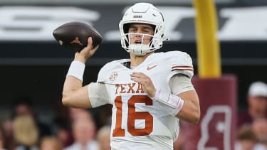 Texas Longhorns quarterback Arch Manning (16) throws a pass