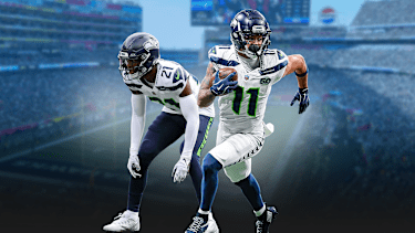 Seattle Wide Receiver Jaxon Smith-Njigba (11)läuft mit dem Ball im Spiel der Seattle Seahawks und Devon Witherspoon in Coverage.