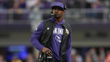 Minneapolis, Minnesota, USA; Minnesota Vikings defensive coordinator Brian Flores looks on against the Green Bay Packers
