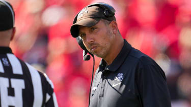 Oct 4, 2025; Cincinnati, Ohio, USA; Iowa State Cyclones head coach Matt Campbell talks with an official during the game against the Cincinnati Bearcats in the second half at Nippert Stadium. Mandatory Credit: Aaron Doster-Imagn Images