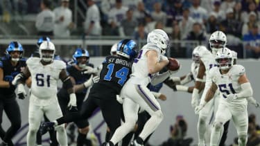 NFL, American Football Herren, USA Detroit Lions at Minnesota Vikings Dec 25, 2025; Minneapolis, Minnesota, USA; Minnesota Vikings safety Harrison Smith (22) intercepts a pass intended for Detroit Lions wide receiver Amon-Ra St. Brown (14) in the third quarter at U.S. Bank Stadium. Minneapolis U.S. Bank Stadium Minnesota USA, EDITORIAL USE ONLY PUBLICATIONxINxGERxSUIxAUTxONLY Copyright: xMattxKrohnx 20251225_hlf_hw1_209