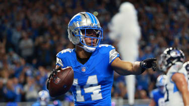 DETROIT,MICHIGAN-October 27: Detroit Lions wide receiver Amon-Ra St. Brown (14) scores a touchdown during the first half of an NFL football game between the Tennessee Titans and the Detroit Lions in Detroit, Michigan USA, on Sunday, October 27, 2024 (Photo by Jorge Lemus/NurPhoto)