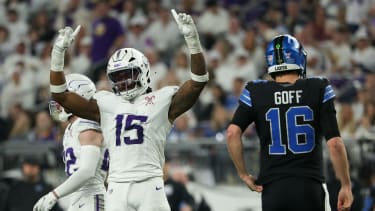 Dec 25, 2025; Minneapolis, Minnesota, USA; Minnesota Vikings linebacker Dallas Turner (15) celebrates after a play as Detroit Lions quarterback Jared Goff (16) reacts in the second half at U.S. Bank Stadium. Mandatory Credit: Matt Krohn-Imagn Images