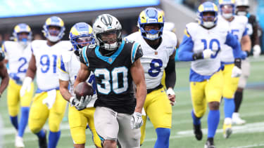 CHARLOTTE, NC - NOVEMBER 30: Carolina Panthers running back Chuba Hubbard (30) leaves the defense behind him as he runs to score a touchdown during an NFL, American Football Herren, USA football game between the Los Angeles Rams and the Carolina Panthers on November 30, 2025 at Bank of America Stadium in Charlotte, N.C. (Photo by John Byrum Icon Sportswire) NFL: NOV 30 Rams at Panthers EDITORIAL USE ONLY Icon25113001