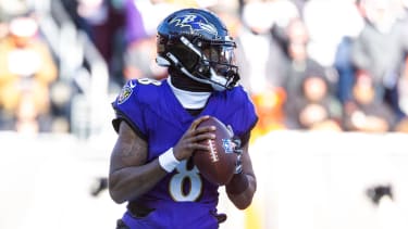 Baltimore Ravens quarterback Lamar Jackson (8) passes the ball