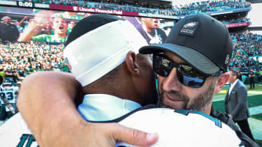 Sep 21, 2025; Philadelphia, Pennsylvania, USA; Philadelphia Eagles quarterback Jalen Hurts (1) and head coach Nick Sirianni hug after a victory against the Los Angeles Rams at Lincoln Financial Field. Mandatory Credit: Bill Streicher-Imagn Images