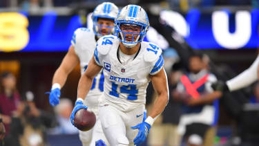 Detroit Lions wide receiver Amon-Ra St. Brown (14) celebrates after a touchdown