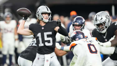 Dec 7, 2025; Paradise, Nevada, USA;  Las Vegas Raiders quarterback Kenny Pickett (15) throws downfield against the Denver Broncos during the second half at Allegiant Stadium. Mandatory Credit: Stephen R. Sylvanie-Imagn Images