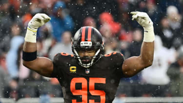 Cleveland Browns defensive end Myles Garrett (95) riles up the crowd