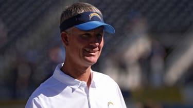 San Diego Chargers head coach Mike McCoy smiles before the game