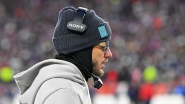 Jan 4, 2026; Foxboro, Massachusetts, USA; Miami Dolphins head coach Mike McDaniel watches from the sideline during the first half against the New England Patriots at Gillette Stadium, in Foxborough, Massachusetts. CSM Foxborough USA - ZUMAc04_ 20260104_faf_c04_126 Copyright: xEricxCanhax
