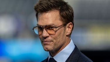 INGLEWOOD, CA - DECEMBER 14: Fox Sports commentator and former NFL, American Football Herren, USA quarterback Tom Brady on the field during pregame warmups before an NFL football game between the Detroit Lions and Los Angeles Rams at SoFi Stadium, December 14, 2025, in Inglewood, California. (Photo by Tony Ding Icon Sportswire) NFL: DEC 14 Lions at Rams EDITORIAL USE ONLY Icon46520251214029