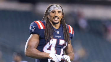 PHILADELPHIA, PA - AUGUST 19: Jakob Johnson #47 of the New England Patriots looks on against the Philadelphia Eagles in the preseason game at Lincoln Financial Field on August 19, 2021 in Philadelphia, Pennsylvania. The Patriots defeated the Eagles 35-0. (Photo by Mitchell Leff/Getty Images)