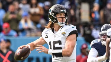 Jacksonville Jaguars quarterback Trevor Lawrence (16) passes the ball during the NFL