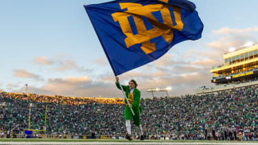 Oct 11, 2025; South Bend, Indiana, USA; The Notre Dame Leprechaun waves an ND flag after a Fighting Irish touchdown against the NC State Wolfpack during the second half at Notre Dame Stadium. Mandatory Credit: Michael Caterina-Imagn Images