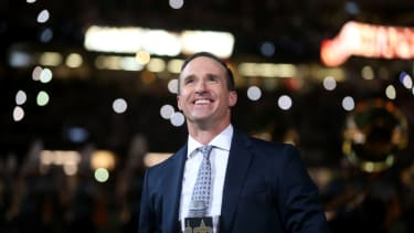 Nov 25, 2021; New Orleans, Louisiana, USA; Former New Orleans Saints quarterback Drew Brees is honored at halftime of the game between the New Orleans Saints and the Buffalo Bills at the Caesars Superdome. Mandatory Credit: Chuck Cook-Imagn Images