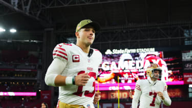 Nov 16, 2025; Glendale, Arizona, USA; San Francisco 49ers quarterback Brock Purdy (13) runs off the field after defeating the Arizona Cardinals at State Farm Stadium. Mandatory Credit: Joe Camporeale-Imagn Images